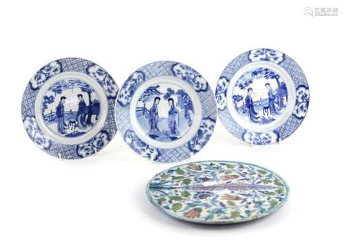 Three Chinese blue and white dishes decorated with Manchu/Chinese 'Long Elizas', each dish with