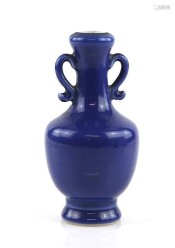 A powder blue monochrome vase with pierced handles and oviform body; nearly 15 cm high, underglaze