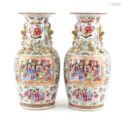 A Pair of Canton famille rose vases; each one decorated with typical narrative scenes of Manchu/