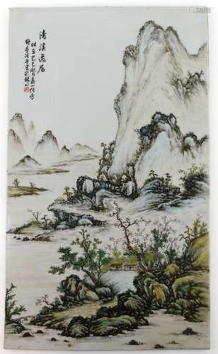 A famille rose porcelain plaque of rectangular form, decorated with a mountainous river landscape;