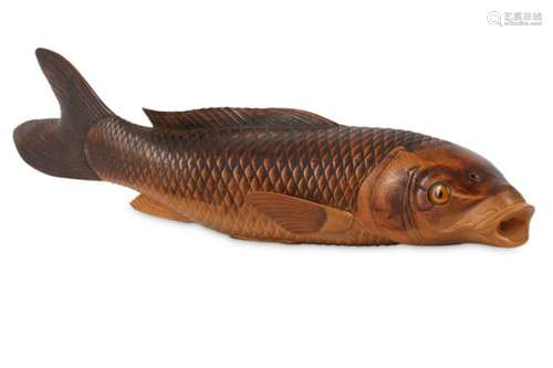 A WOOD OKIMONO OF A CARP. Meiji period. Naturalistically carved with engraved and slightly stained