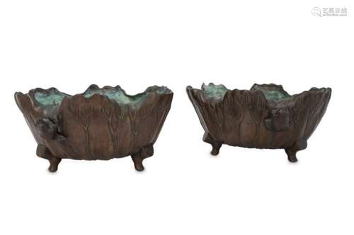 A PAIR OF BRONZE LOTUS LEAF BOWLS. Meiji period. Each supported on three feet, applied with two