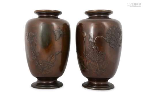 A PAIR OF BRONZE VASES. Meiji period. Decorated in low relief with a continuous design of poppies