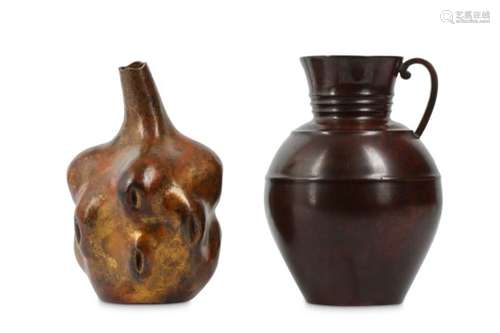 TWO BRONZE VASES. 20th Century. Of ovoid form with ringed neck and a shaped handle, a deep red