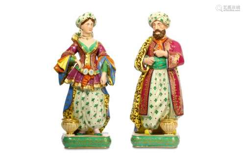 A PAIR OF FRENCH PORCELAIN FIGURAL CANDLE HOLDERS