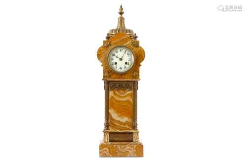 A LATE 19TH CENTURY FRENCH ONYX AND GILT BRONZE MOUNTED MANTEL CLOCK MODELLED AS A MINARET