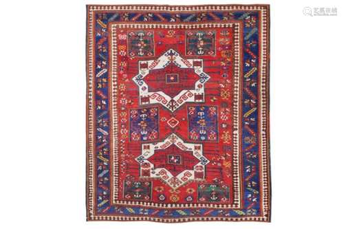 AN ANTIQUE FACHRALO KAZAK RUG, SOUTH CAUCASUS