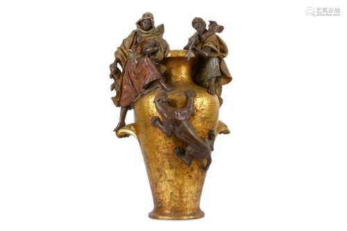 A LARGE EARLY 20TH CENTURY AUSTRIAN TERRACOTTA URN DECORATED WITH AN ARAB HUNTING SCENE IN THE MANNE