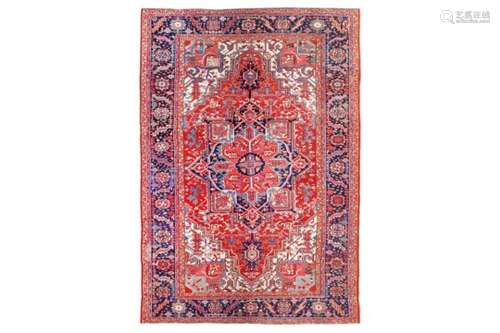 AN ANTIQUE HERIZ CARPET, NORTH-WEST PERSIA