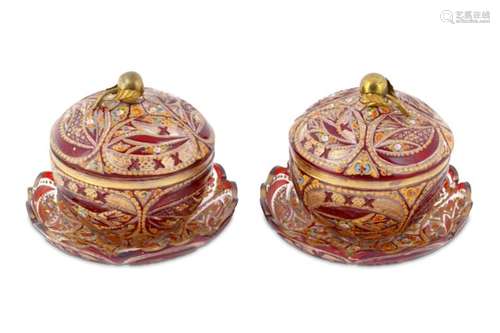 A PAIR OF RED AND GILT BOHEMIA CUT-GLASS BOWLS WITH SAUCERS FOR THE IRANIAN MARKET