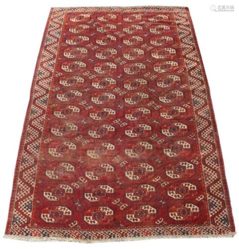 Property of a gentleman - an early / mid 20th century Turkoman carpet, 112 by 76ins. (284 by