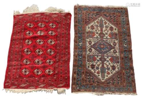 Property of a deceased estate - a small Turkoman rug with three rows of guls, 54 by 41ins. (137 by
