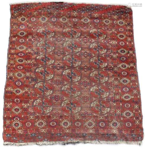 Property of a deceased estate - an early 20th century Turkoman rug, 49 by 44ins. (125 by 112cms.).