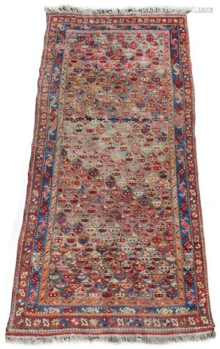 Property of a deceased estate - an early 20th century Caucasian long rug, with all-over field, 88 by