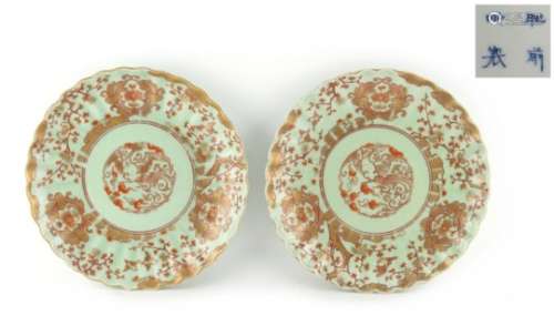 A pair of Japanese porcelain celadon ground plates, circa 1900, decorated in gilt & iron red with