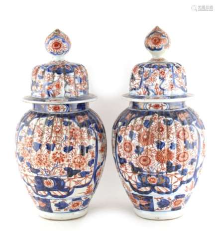 Property of a lady - a pair of 19th century Japanese Imari ribbed vases or jars & covers, 13.