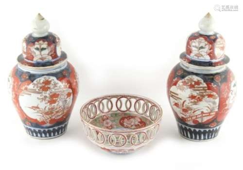 Property of a lady - a pair of 19th century Japanese Imari vases & covers, each 9.75ins. (24.