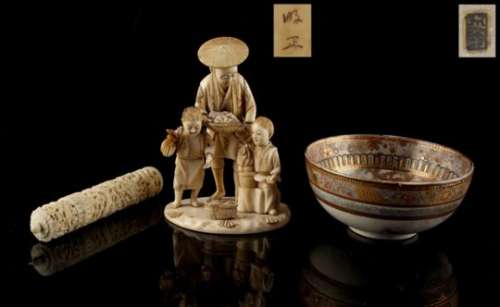 Property of a lady - a Japanese carved ivory group, Meiji period (1868-1912); together with a