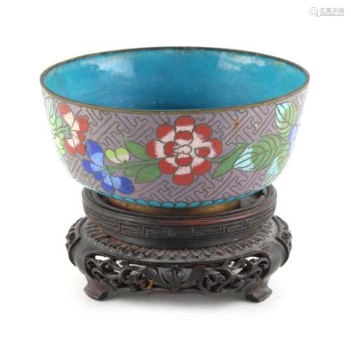 Property of a lady - a Japanese cloisonne bowl, decorated with flowers, 4.3ins. (11cms.) diameter,