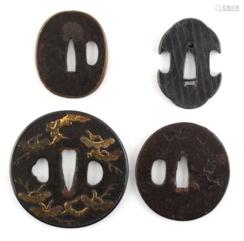 A collection of Japanese tsubas, 18th and 19th century, mixed metals - four assorted tsubas (4).