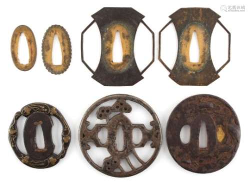 A collection of Japanese tsubas, 18th and 19th century, mixed metals - four assorted tsubas (4).