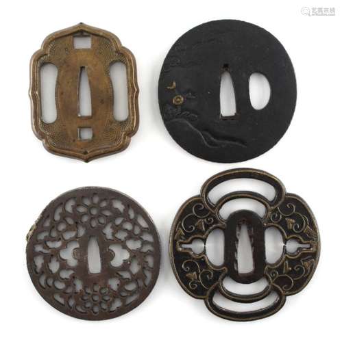 A collection of Japanese tsubas, 18th and 19th century, mixed metals - four assorted tsubas (4).