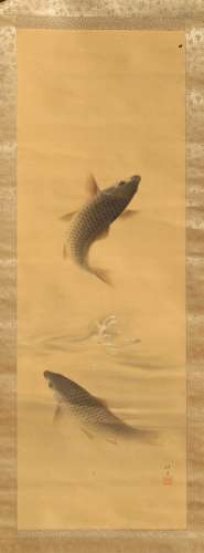An early 20th century Japanese scroll painting on silk depicting two carp, signed & with red seal,
