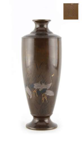 A good Japanese bronze & mixed metal vase decorated with red crowned cranes in lake shallows, late