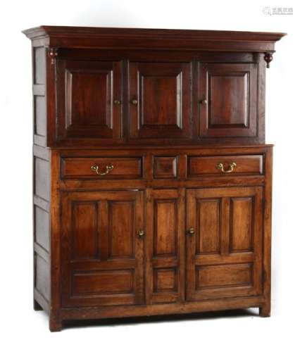 Property of a deceased estate - an 18th century oak two-part court cupboard, of pegged construction,