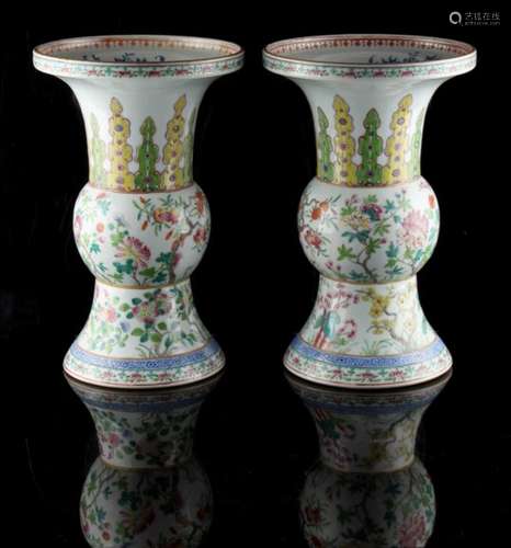 Property of a deceased estate - a pair of Chinese famille rose hu vases, painted in bright enamels