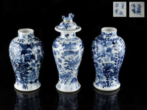 Property of a lady - a pair of 19th century Chinese blue & white baluster vases, each painted with