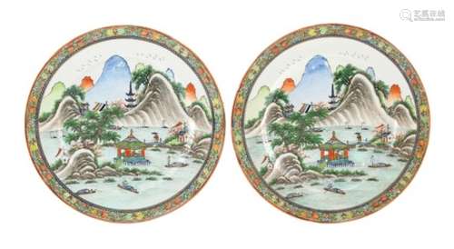 Property of a lady - a pair of Chinese Republic period plates, each painted with a landscape with