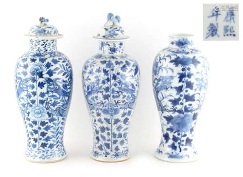 Property of a lady - three 19th century Chinese blue & white baluster vases with two covers, each