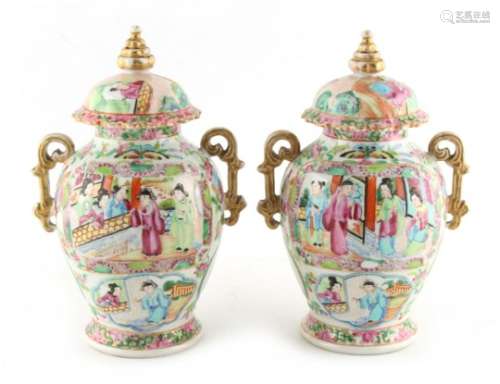 Property of a lady - a pair of late 19th century Chinese Canton famille rose two-handled baluster