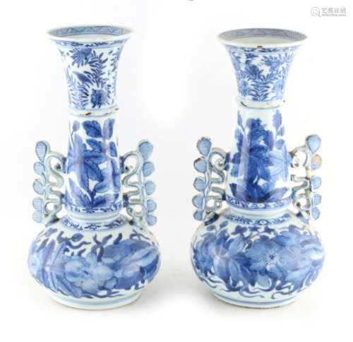 Property of a lady - a pair of Chinese blue & white porcelain bottle vases with frill handles, the