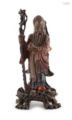 Property of a lady - a Chinese carved & lacquered wood figure of Shoulao, circa 1900, modelled