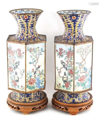 Property of a lady - a pair of early 20th century Chinese Canton enamel hexagonal vases, each