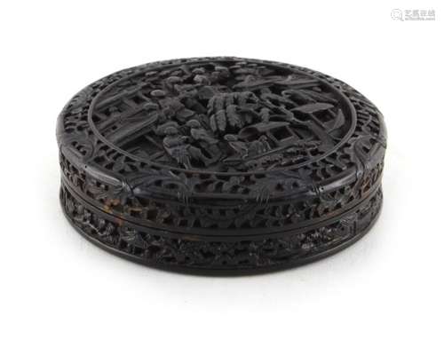 A 19th century Chinese Canton carved tortoiseshell circular box, carved with figures by