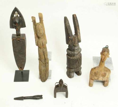 West Africa, six wooden objects, a.o. Bamana lock fragmentDogon figure with raised arms and a Lobi