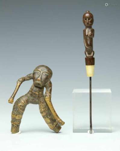 Indonesia, two objects, an implement topped by a female figure and a bamboo figurel 18,2 and 10,8