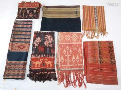 Indonesia, a collection of eleven Ikat textiles,some damaged, worn or faded, retrieved from a