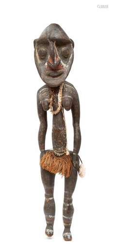 Middle Sepik, Kwoma, standing female figure,with expressive facial traits and painted patterns in