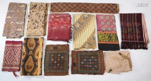 Indonesia, India and other, a collection of various textiles, batik, kelim, ikatsome damaged, worn