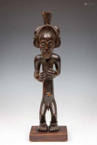 West Angola, Chokwe, standing mounted King-figure with two hands bent in front of chest, elaborate