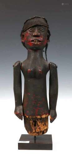 Nigeria, Ibibio, painted wooden puppet figurewith moveable arms and textile headband; h. 32 cm.; [