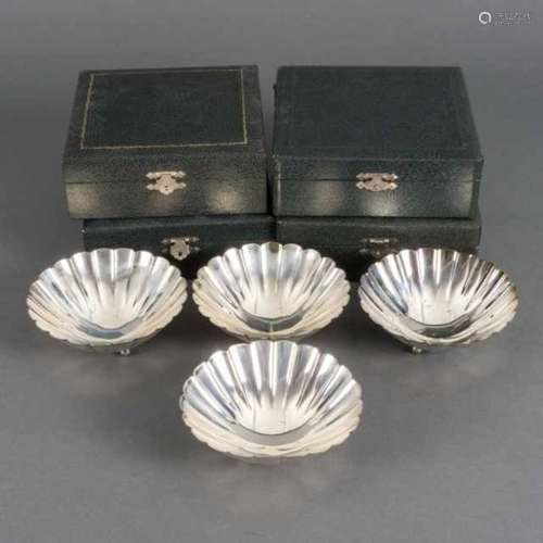 Four sterling silver (950/1000) chrysanthemum-shaped bowls, standing on three ball-shaped feet,