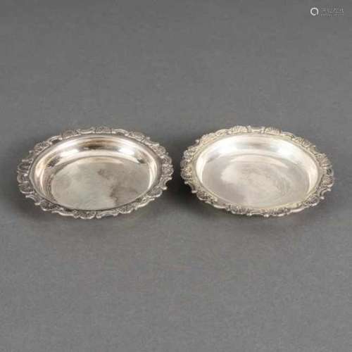 Two sterling silver (950/1000) saucers, the border with a repeated shell pattern, Japan, by