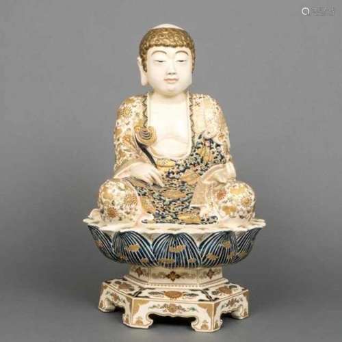 Large Satsuma statue: Buddha sitting in padmasana on a lotus throne with a ruyi scepter in the