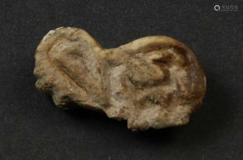 Sumir, 2900-2400 BC, carved bone or ivory stamp amulet,in the shape of a lying lion. The imprint