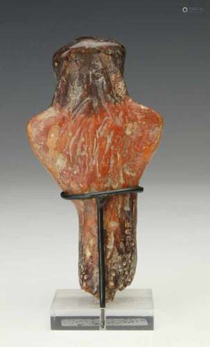 Near Eastern antique terracotta idol,in anthropomorphic form with raised arms. WIth red to black